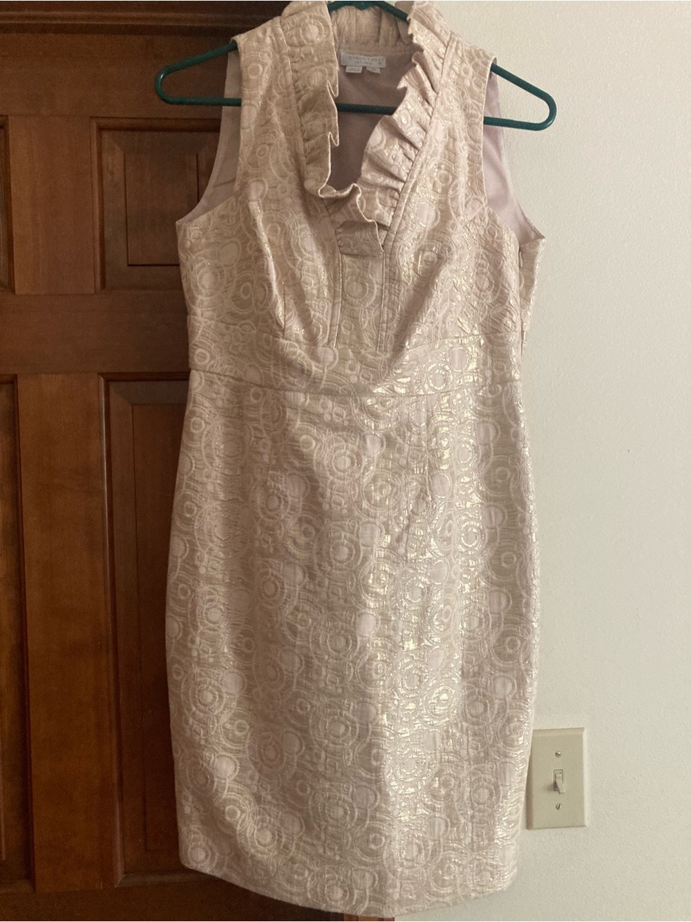 Sleeveless Ruffled V-Neck Sheath Dress in gold. London times